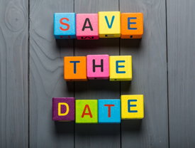 „Save the date“ aus bunten Buchstabenwürfeln zusammengesetzt